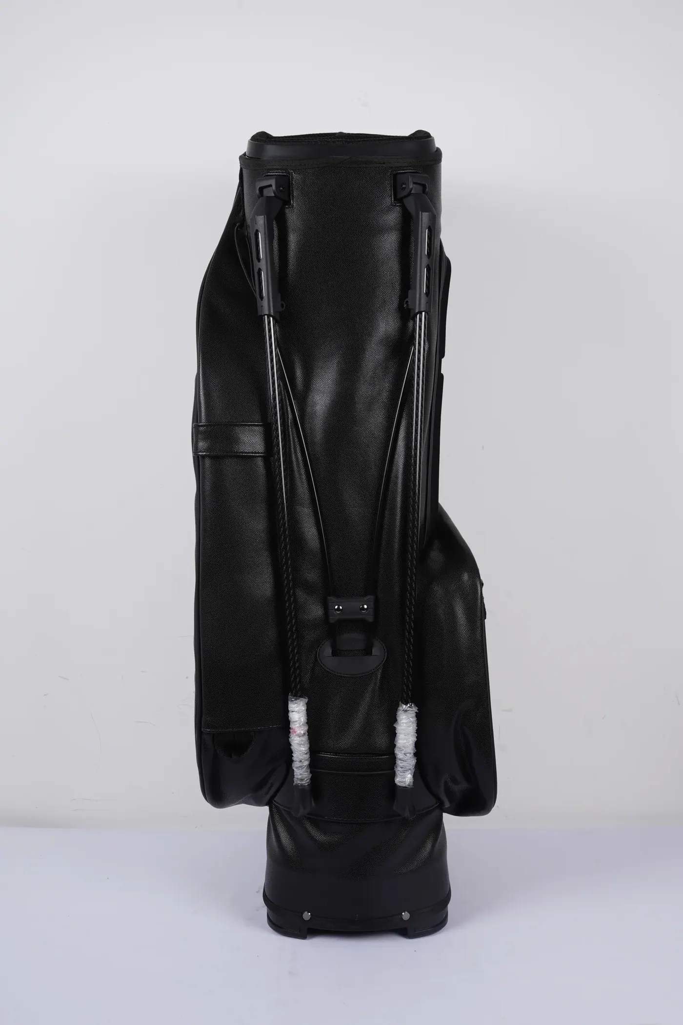Close view of six waterproof backpack closure types laid out side by side including roll-top, airtight zip, coated zip and cam buckle flap