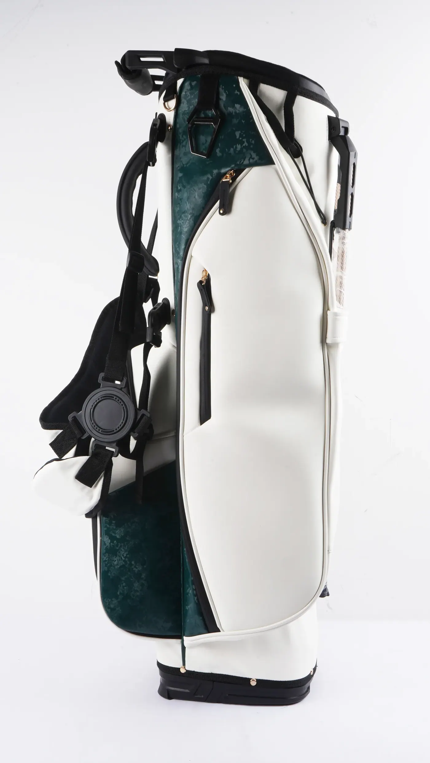Nine waterproof backpack types arranged by activity on a studio floor from a 12 litre submersible pack to a 65 litre expedition body