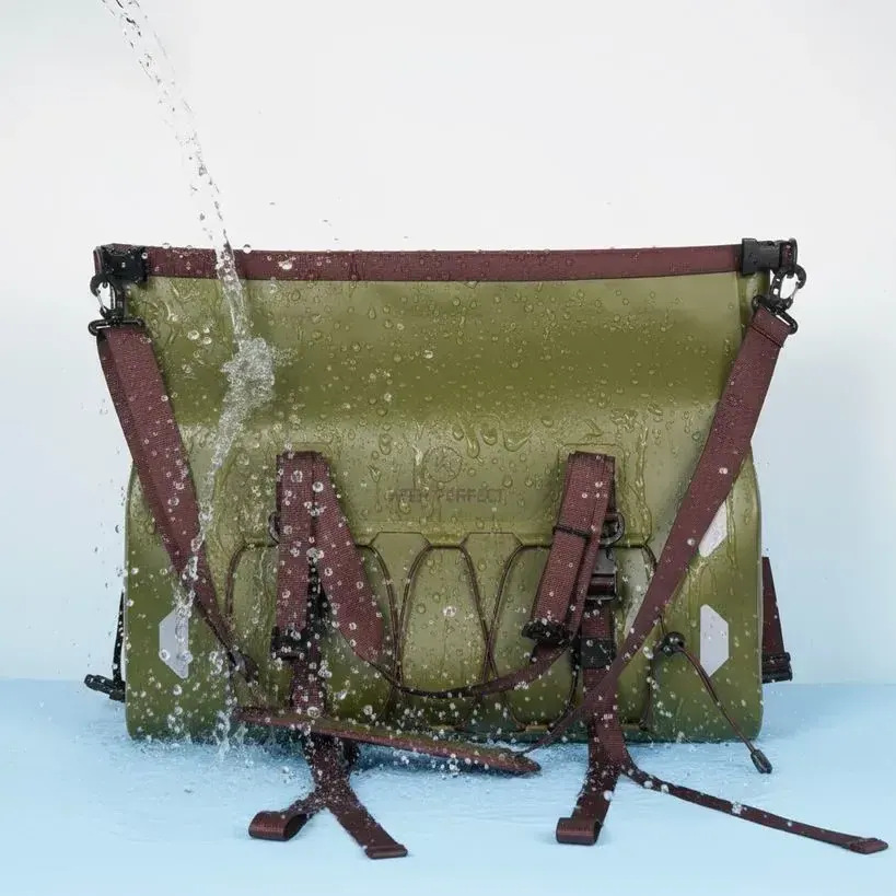 Waterproof expedition backpack loaded and worn on a long distance hike in drizzle with a hip belt