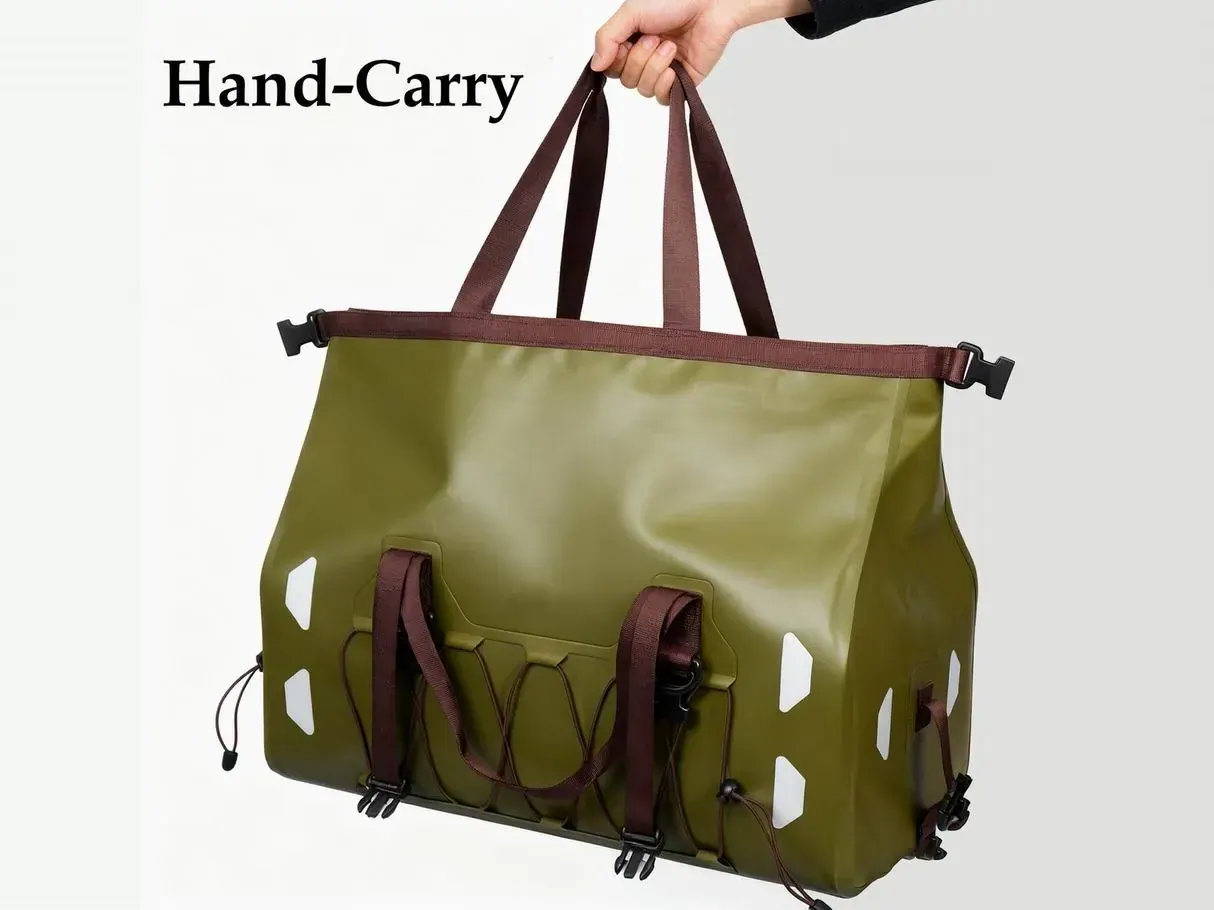 Waterproof outdoor backpack worn on a wet trail with the front pocket zip protected under a storm flap