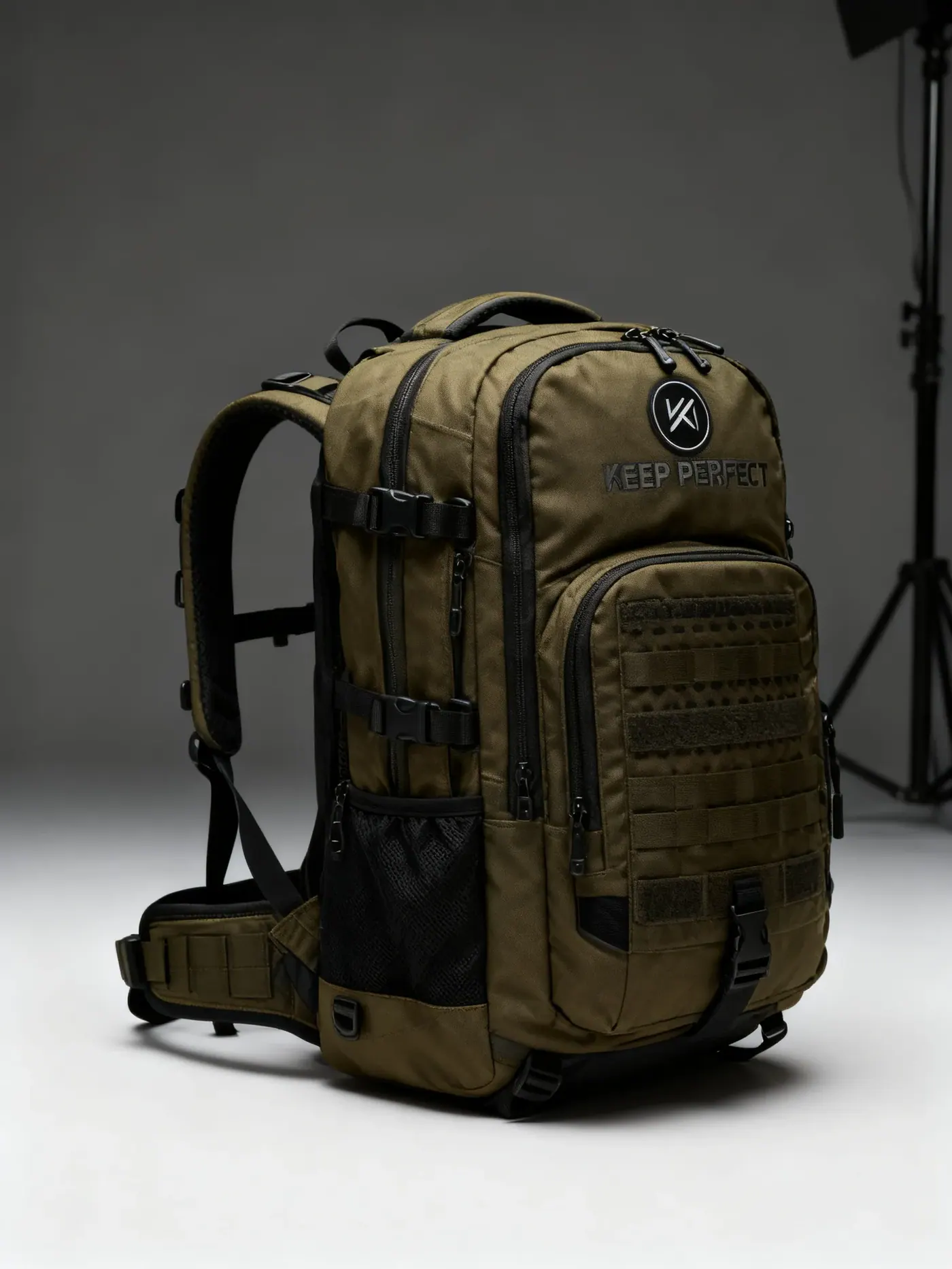 Waterproof hiking backpack on a snowy mountain ridge with crampons strapped in a reinforced external bay and an ice axe held in dedicated shaft loops