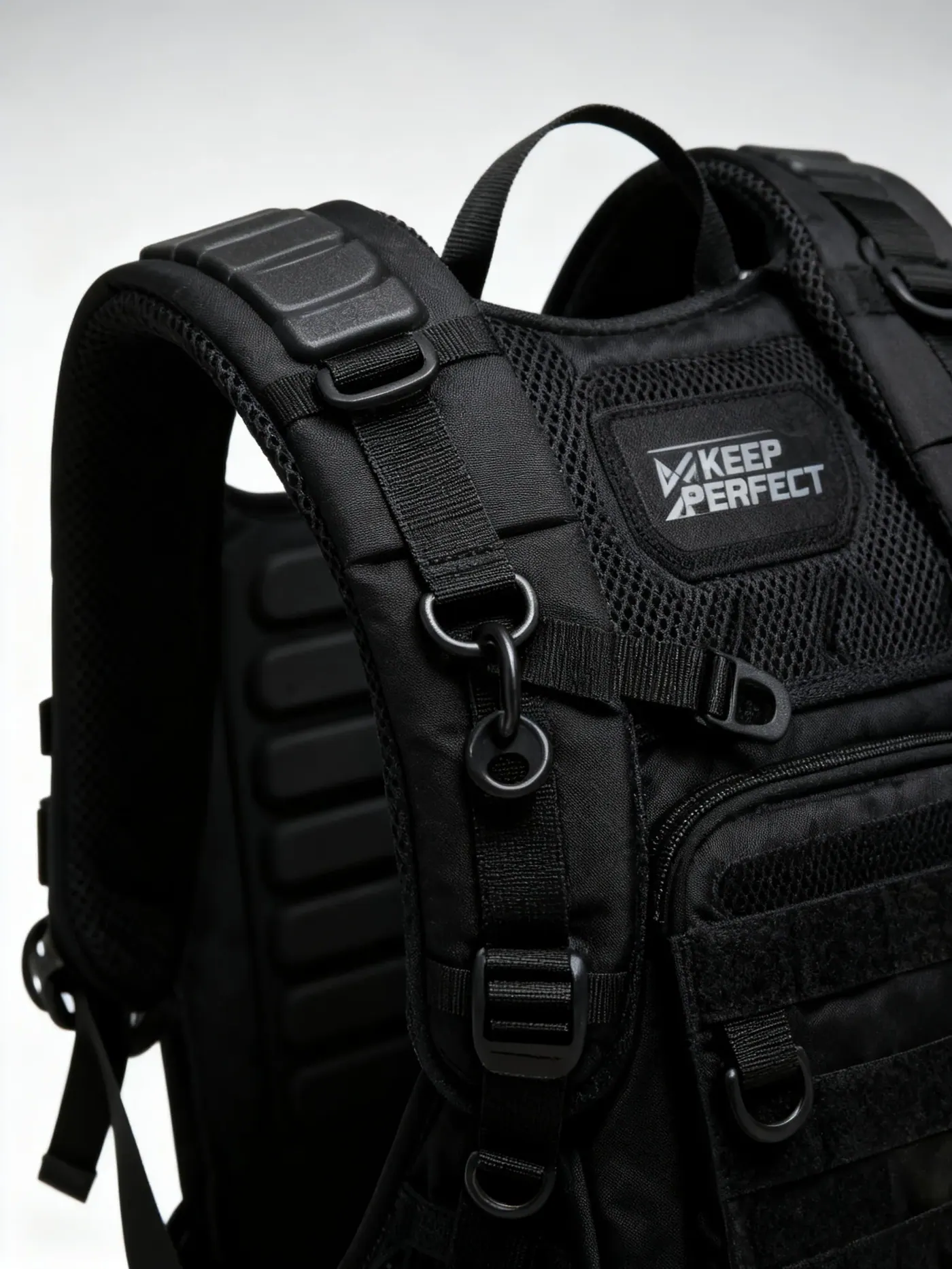 Close view of a muddy waterproof backpack roll-top closure and buckle after a wet gravel ride with grit visible on the webbing