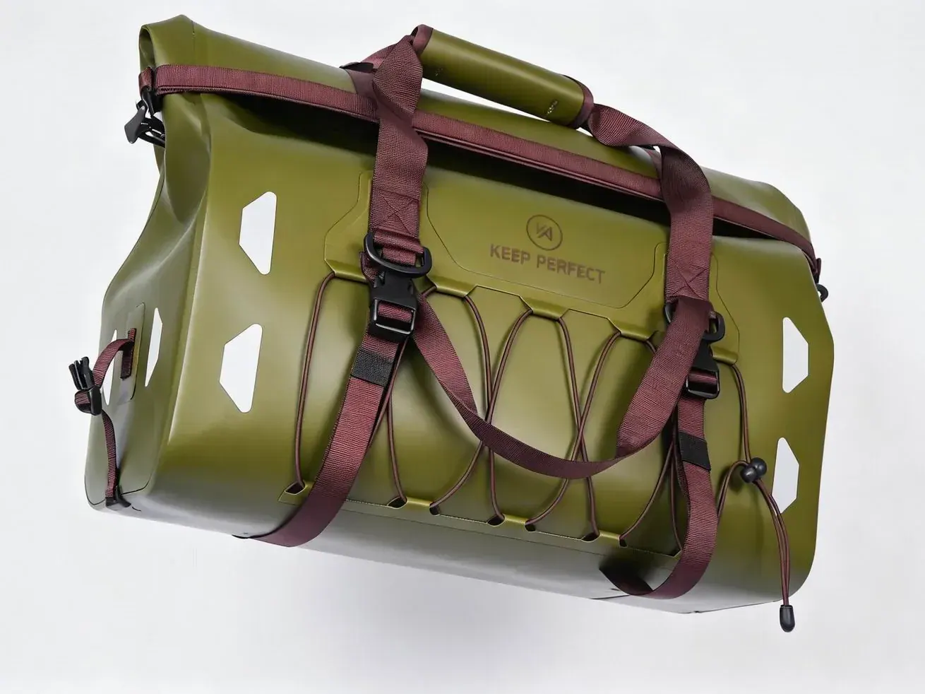 Waterproof dry bag style fishing pack floating beside a kayak with sealed roll closure above the water