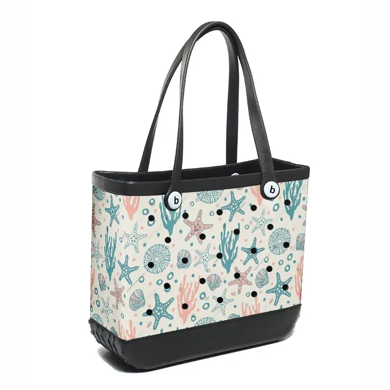 Perforated EVA tote being washed with mild detergent and a soft brush at a outdoor tap, water draining through the base