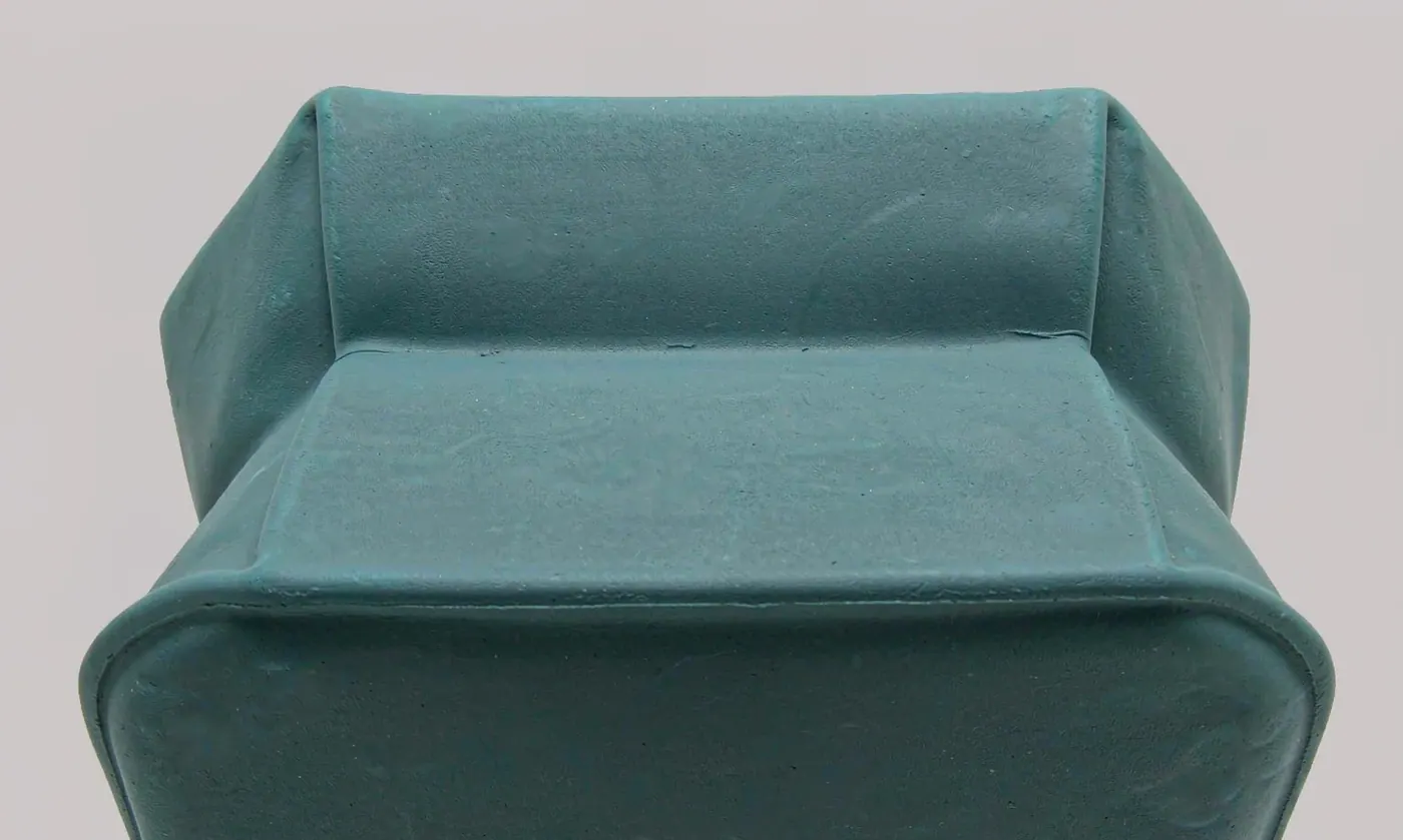 Close view of the base and side wall of a perforated EVA tote showing wall thickness and the continuous base rail